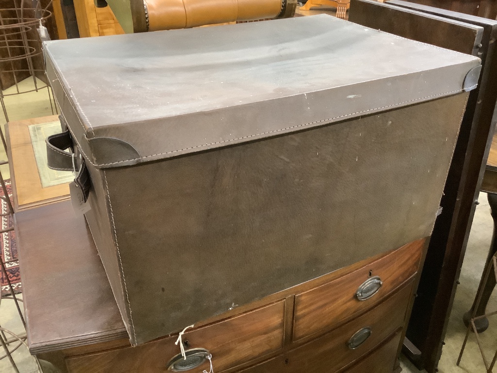 A rectangular brown leather trunk, length 70cm, depth 50cm, height 40cm